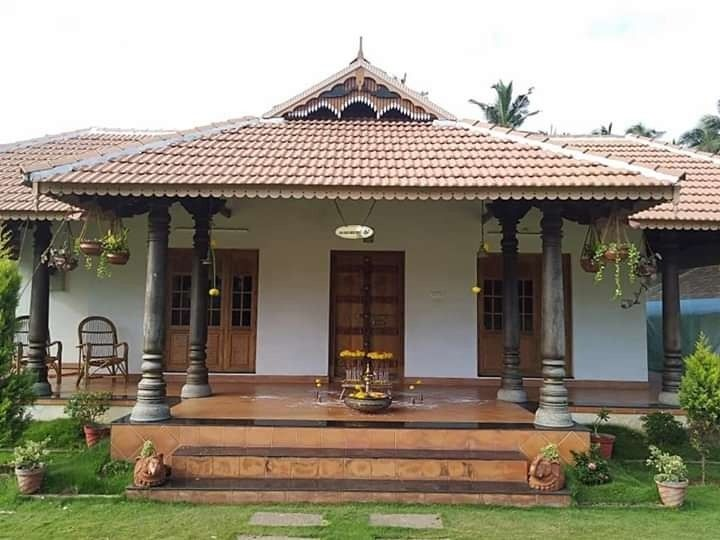 Traditional Nalukettu Revival residential architecture