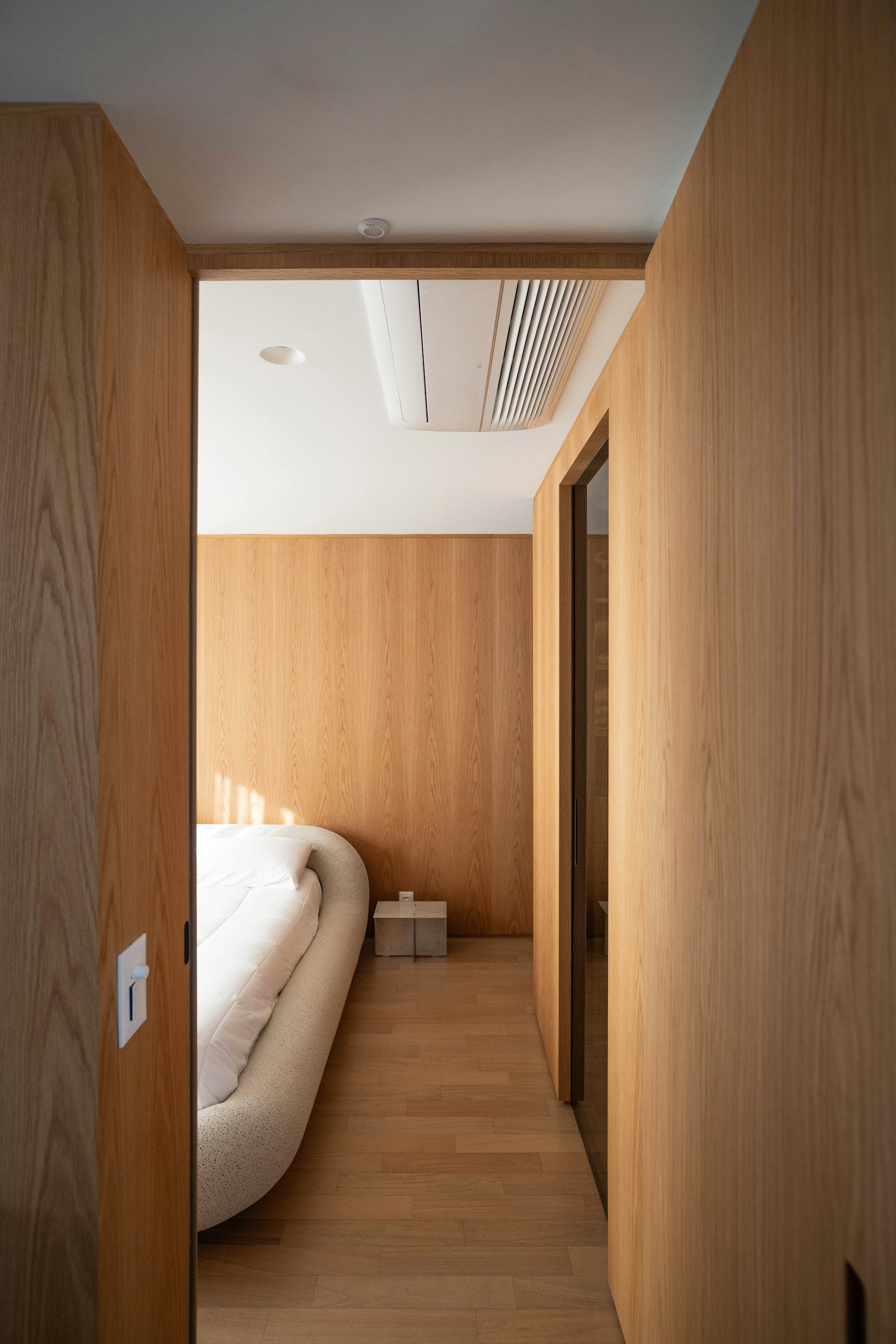 Warm, modern bedroom interior